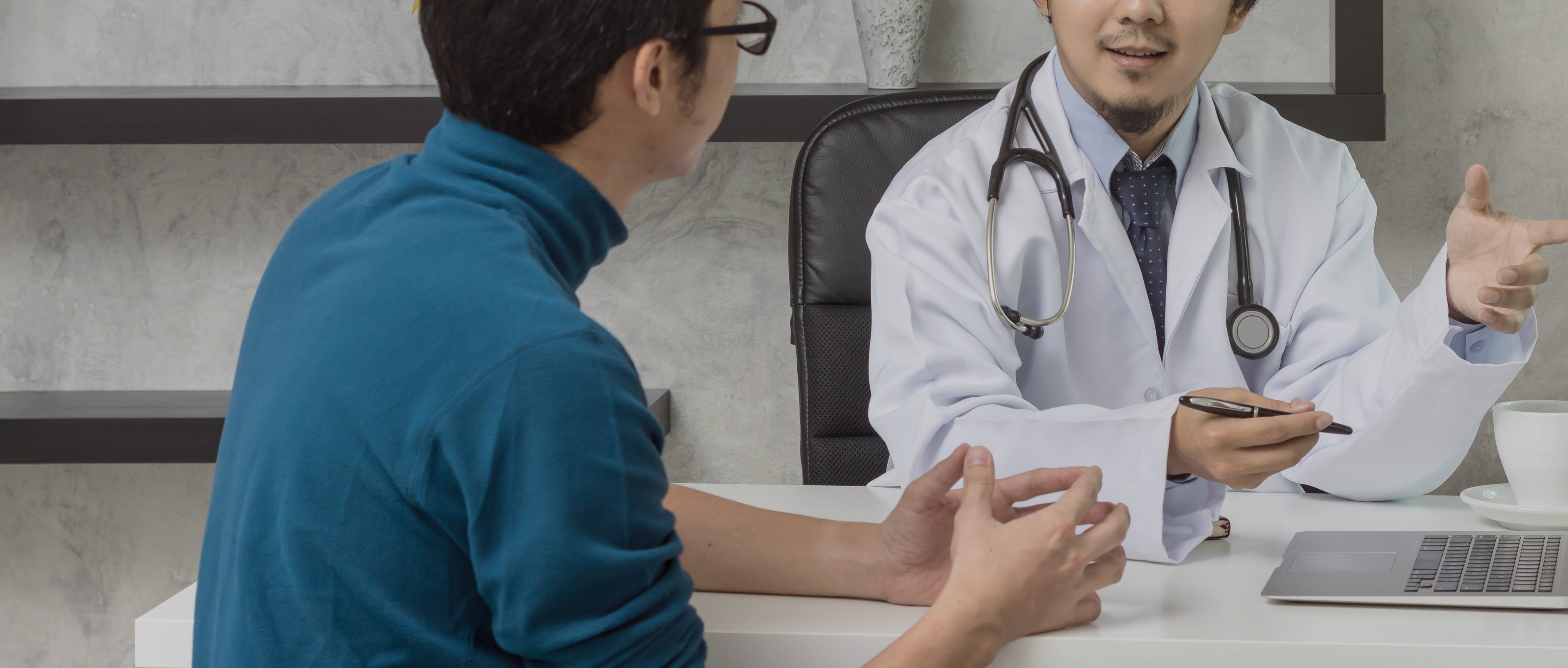 Person speaking with a doctor during a free consultation for weight management and diabetes support in Malaysia