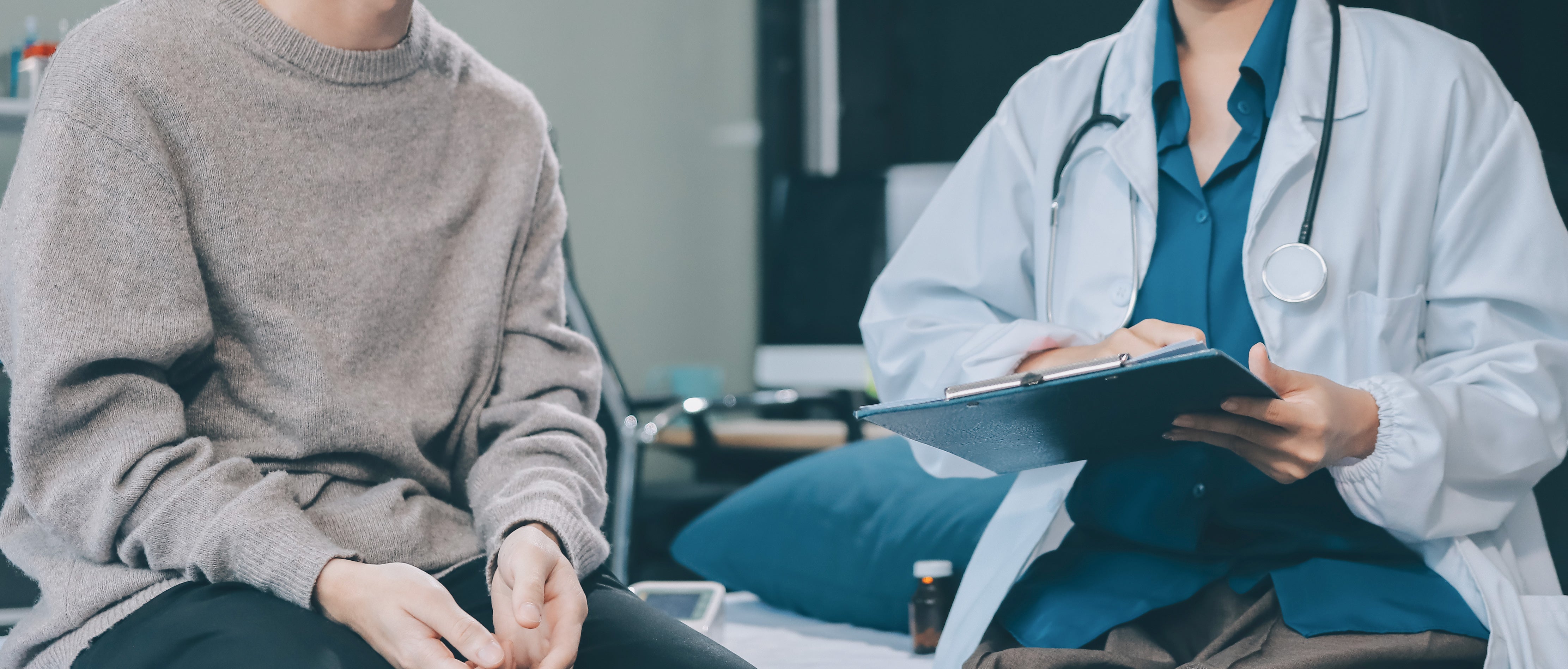 Person speaking with a doctor during a free consultation for weight management and diabetes support in Malaysia